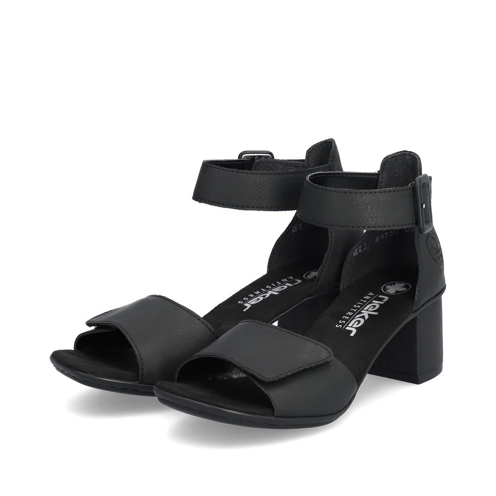 Black Rieker women´s strap sandals 64750-00 with a hook and loop fastener. Shoes laterally.