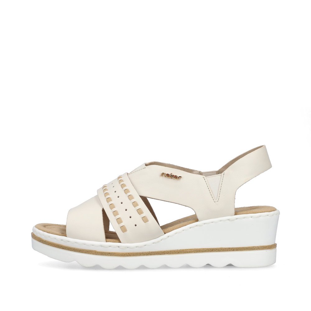 Beige Rieker women´s wedge sandals 67489-60 with an elastic insert. Outside of the shoe.