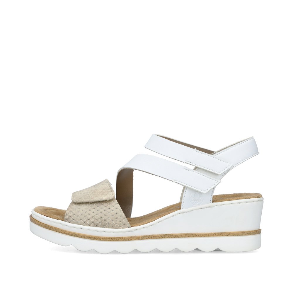 Snow white Rieker women´s wedge sandals 67454-80 with a hook and loop fastener. Outside of the shoe.