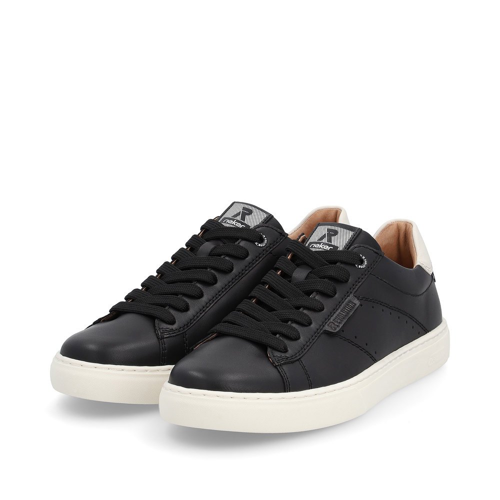 Black Rieker men´s low-top sneakers U0704-00 with a TR sole with light EVA inlet. Shoes laterally.