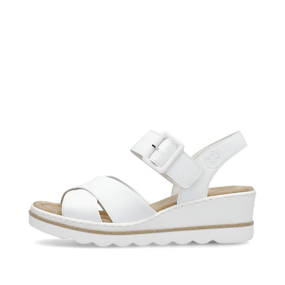 Pure white Rieker women´s wedge sandals 67463-80 with a hook and loop fastener. Outside of the shoe.