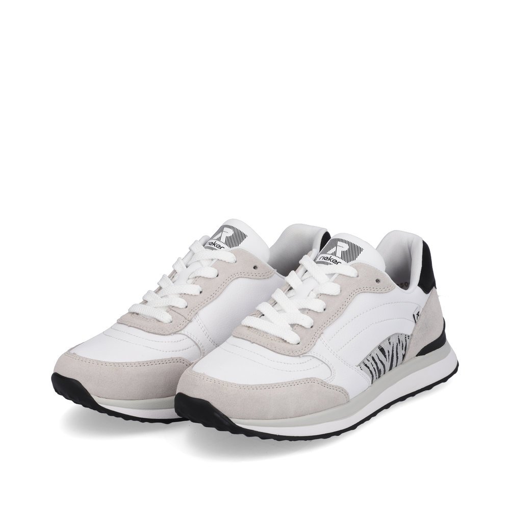 White Rieker women´s low-top sneakers 42506-80 with a super light sole. Shoes laterally.