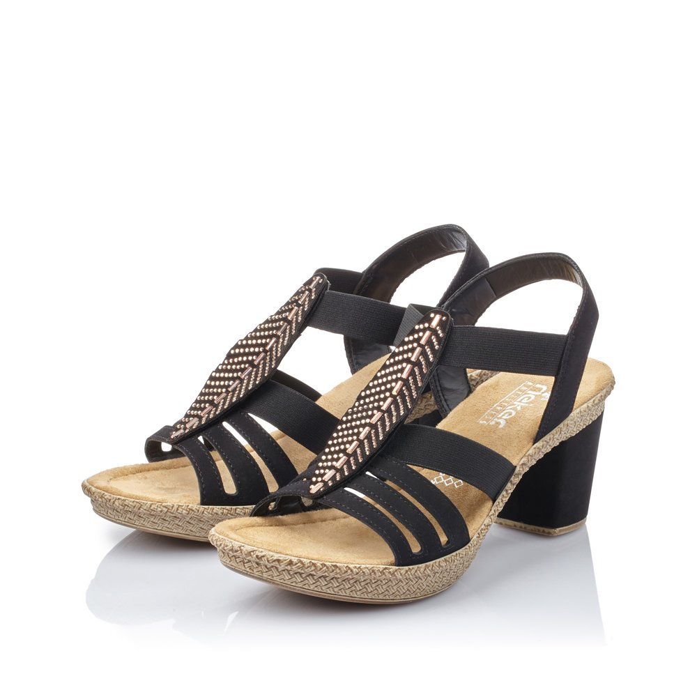 Jet black Rieker women´s strap sandals 66526-00 with an elastic insert. Shoes laterally.