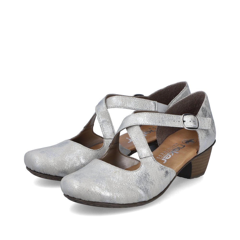 Silver Rieker women´s pumps 41781-40 with a buckle as well as extra soft cover sole. Shoes laterally.