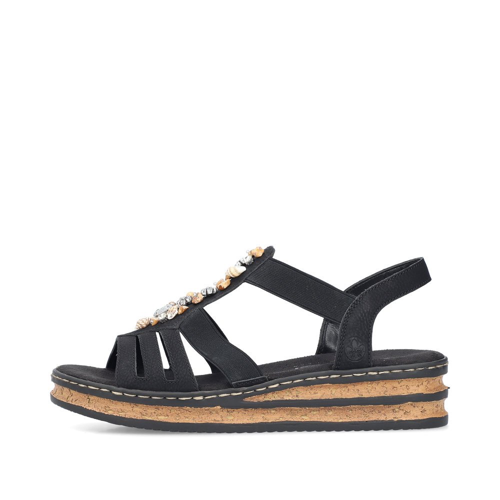 Black Rieker women´s wedge sandals 62949-00 with an elastic insert. Outside of the shoe.