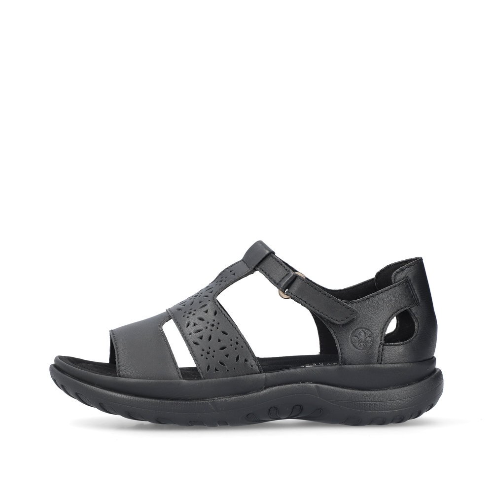 Glossy black Rieker women´s strap sandals 64865-01 with a hook and loop fastener. Outside of the shoe.