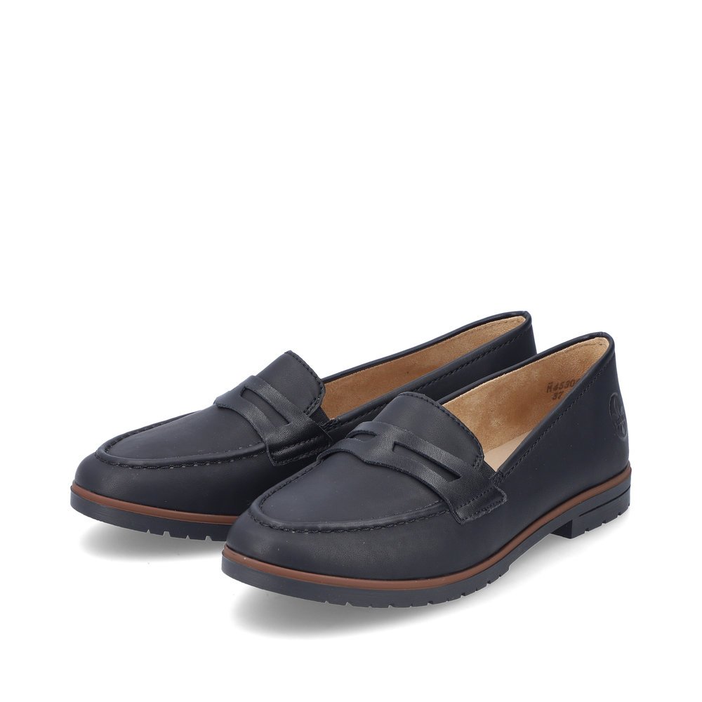 Black Rieker women´s loafers 45300-00 with elastic insert as well as slim fit E 1/2. Shoes laterally.