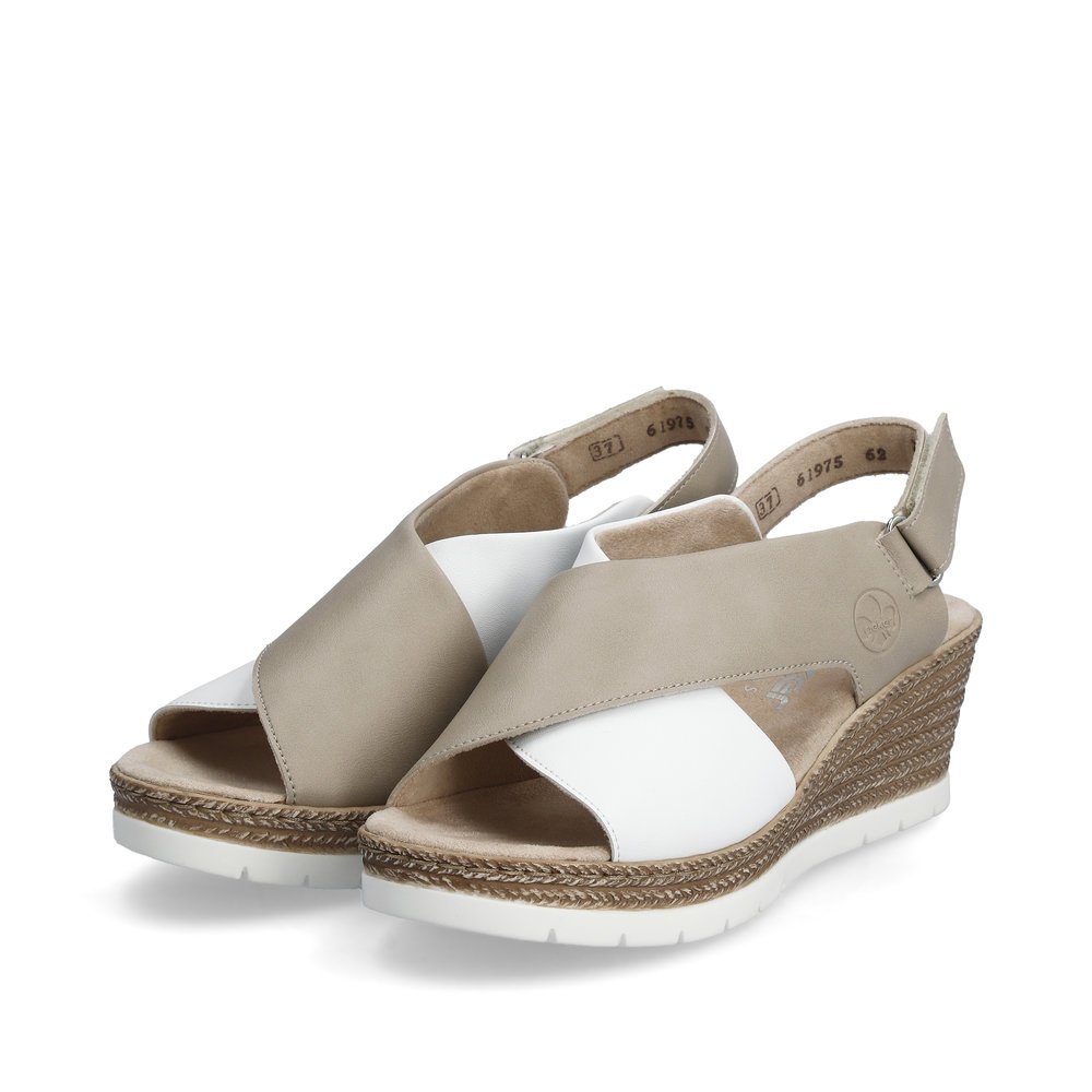 Beige Rieker women´s wedge sandals 61975-62 with a hook and loop fastener. Shoes laterally.
