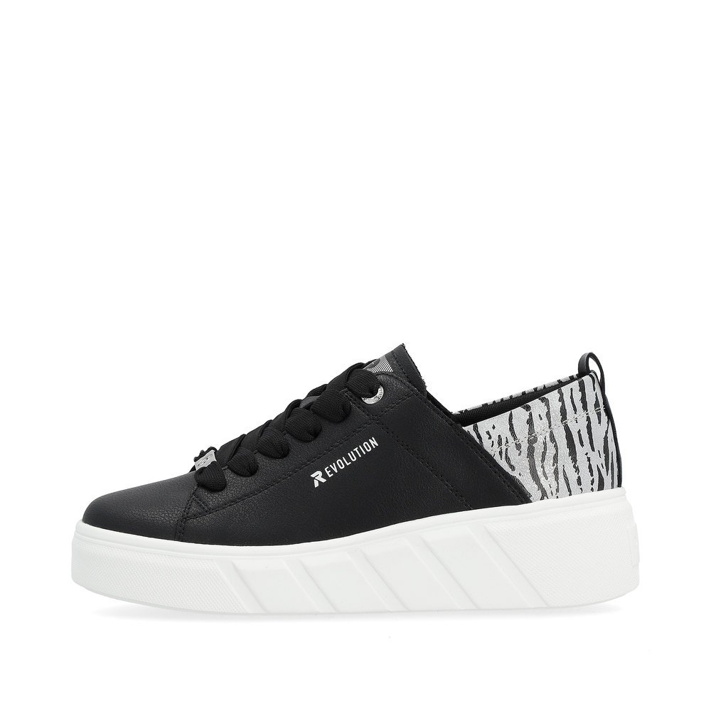 Black Rieker women´s low-top sneakers W0502-02 with an ultra light sole. Outside of the shoe.