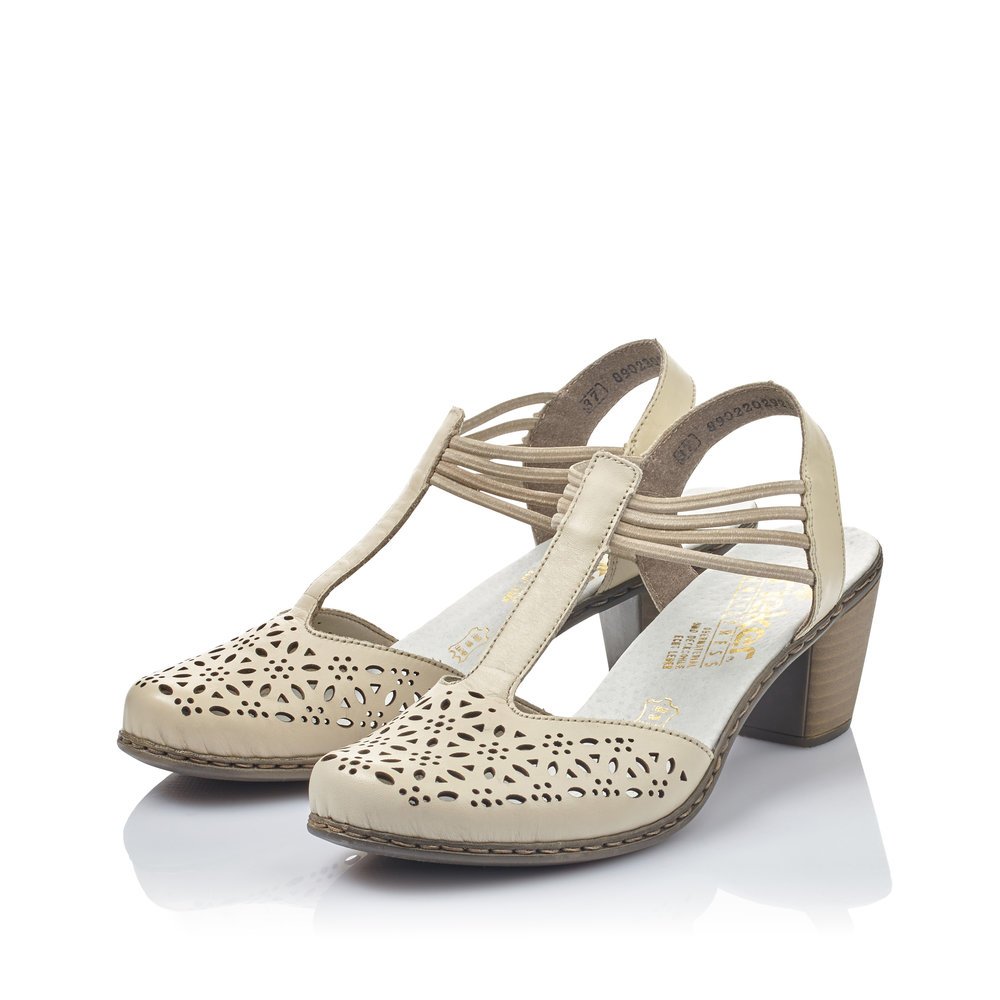 Rieker sandalettes à lanières blanches pour femmes 40969-80. Chaussures inclinée sur le côté.