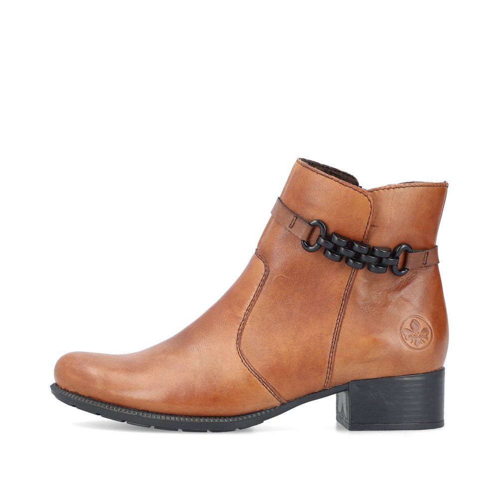 Brown Rieker women´s ankle boots 78676-25 with profile sole with block heel. The outside of the shoe