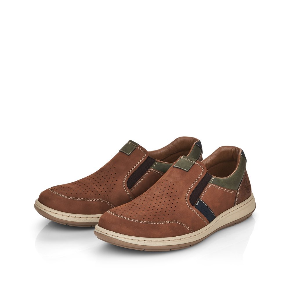 Brown Rieker men´s slippers 17371-25 with elastic insert as well as perforated look. Shoes laterally.