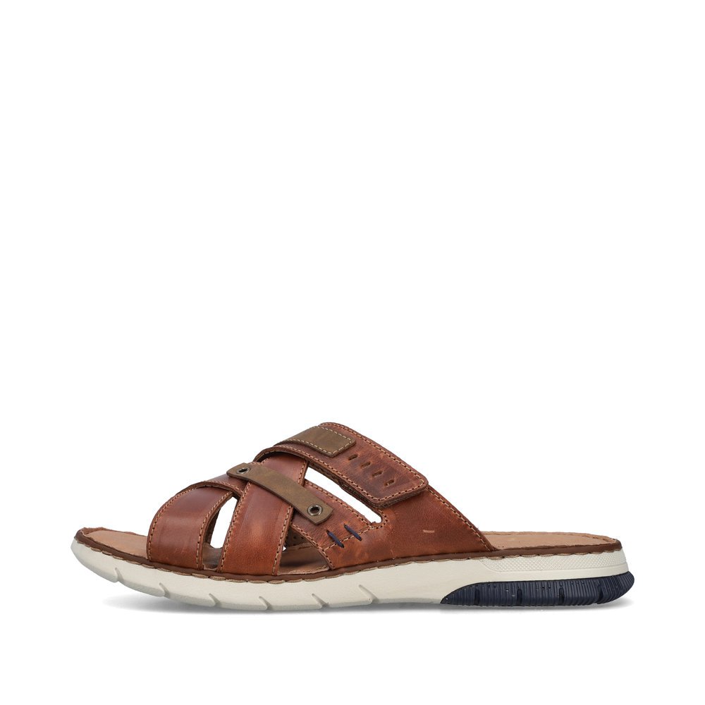 Maroon Rieker men´s mules 25292-24 with a hook and loop fastener. Outside of the shoe.