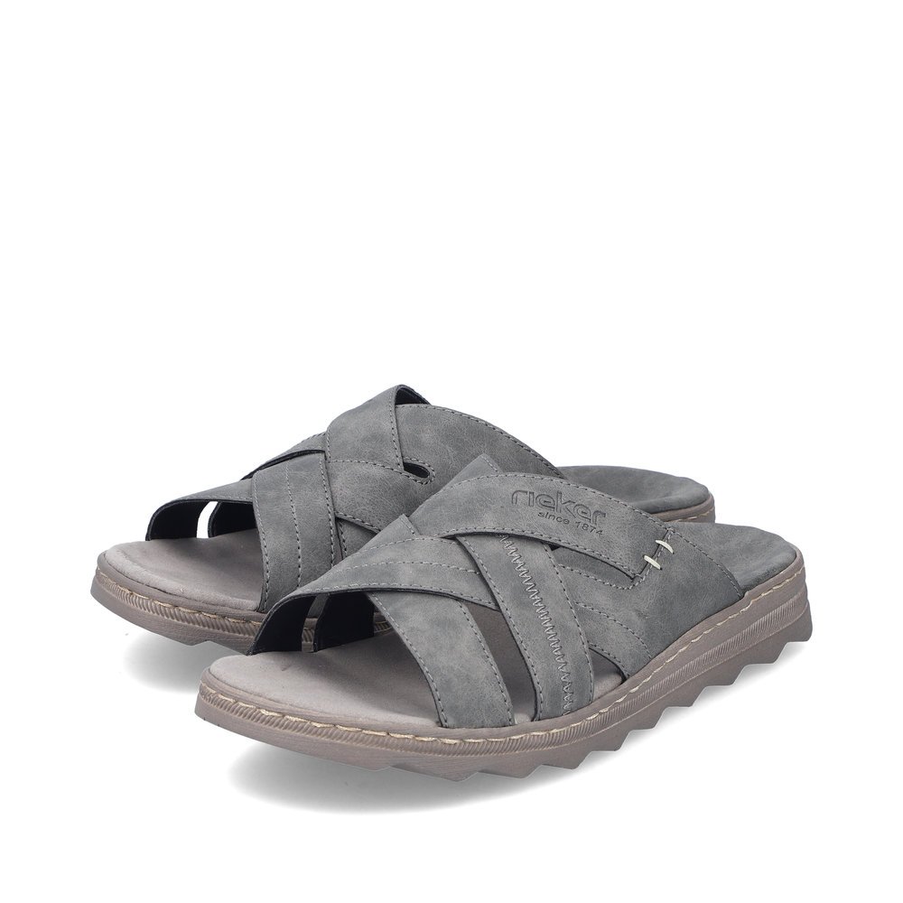 Grey Rieker men´s mules 21690-45 with comfort width G as well as light sole. Shoes laterally.