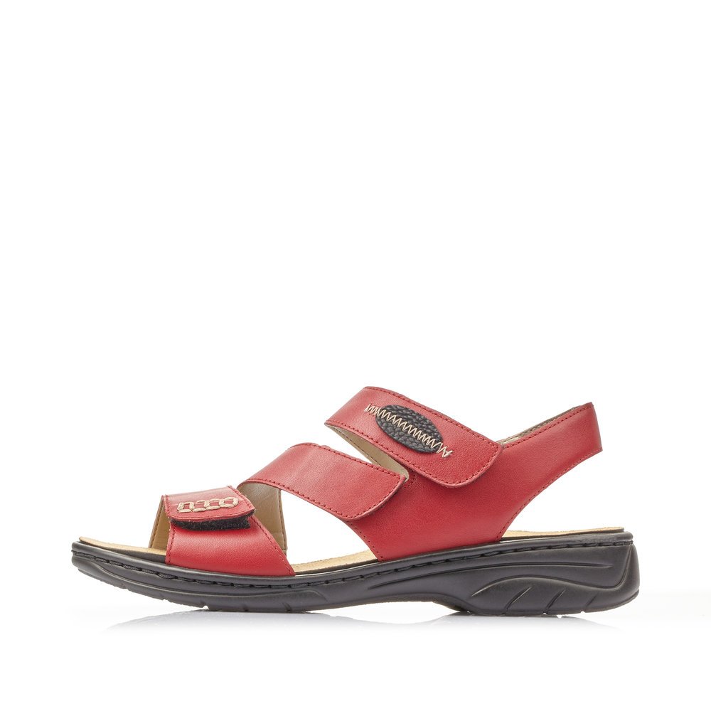 Red Rieker women´s strap sandals 64573-33 with a hook and loop fastener. Outside of the shoe.