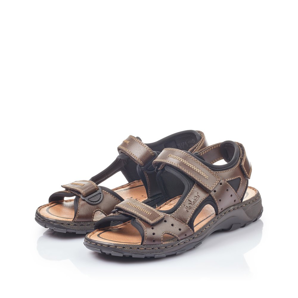 Mocha-colored Rieker men´s hiking sandals 26061-25 with a hook and loop fastener. Shoes laterally.
