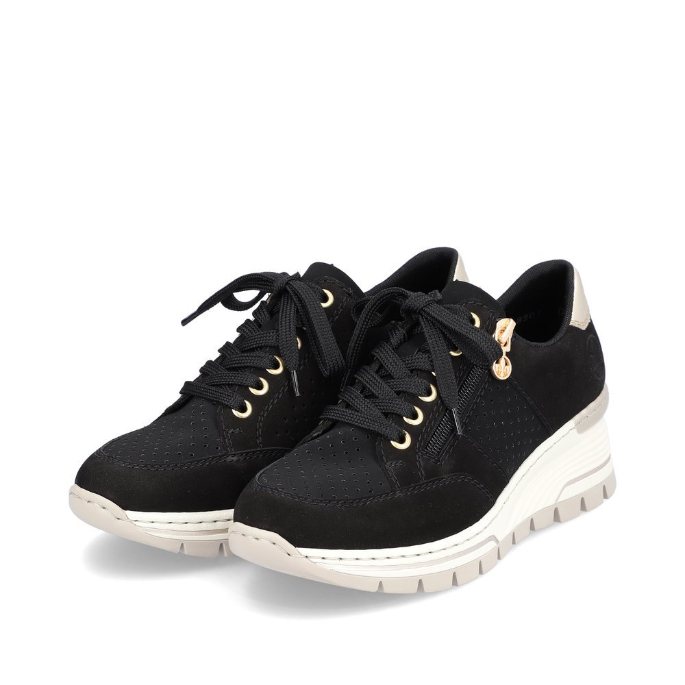 Jet black Rieker women´s low-top sneakers N8301-00 with a zipper. Shoes laterally.