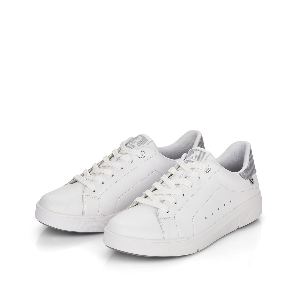 White Rieker women´s low-top sneakers 41902-80 with a flexible and super light sole. Shoes laterally.