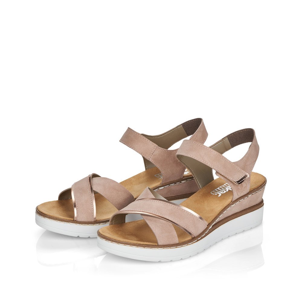 Dusky pink Rieker women´s wedge sandals V38G9-31 with a hook and loop fastener. Shoes laterally.