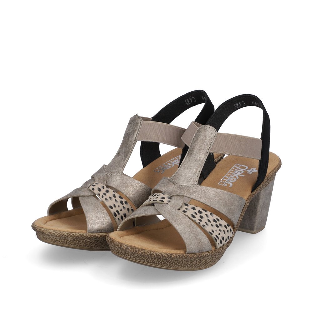 Beige Rieker women´s strap sandals 665K3-60 with an elastic insert. Shoes laterally.