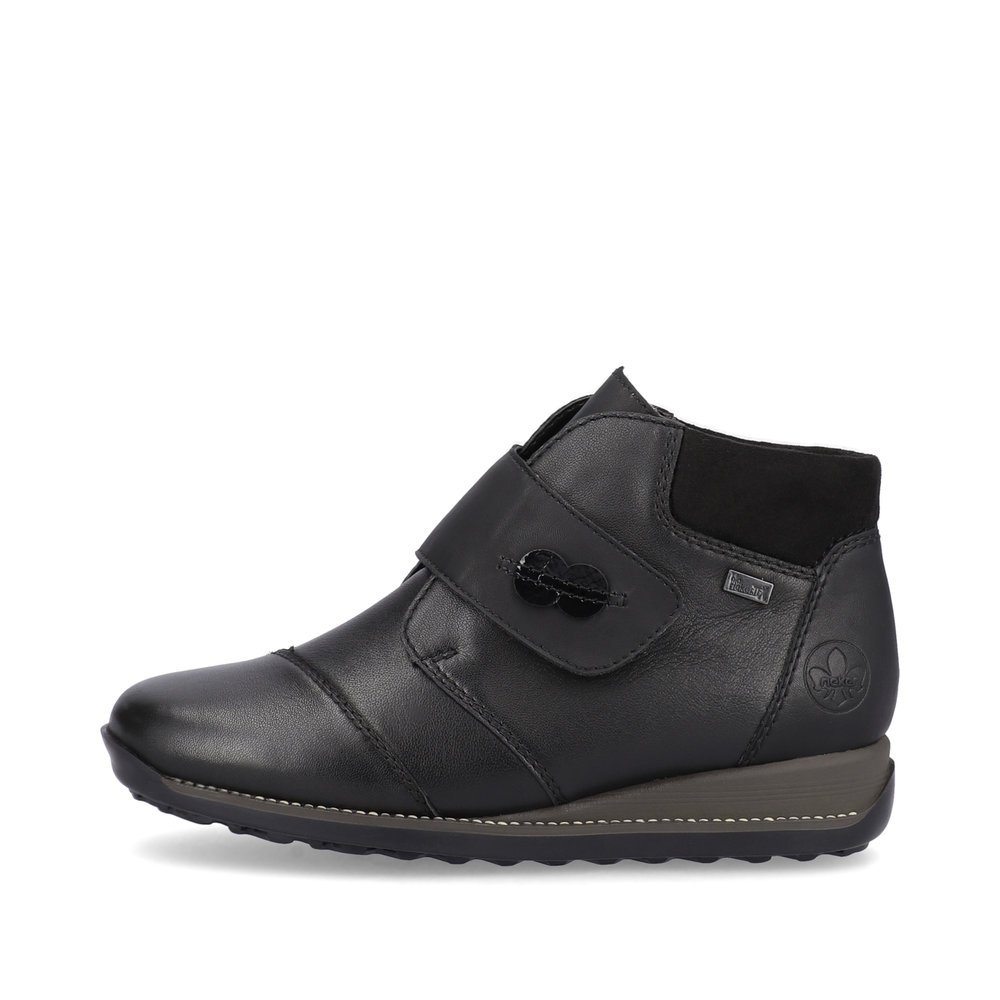 Night black Rieker women´s ankle boots 44255-00 with a hook and loop fastener. The outside of the shoe