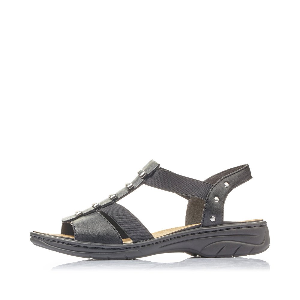 Night black Rieker women´s strap sandals 64580-00 with an elastic insert. Outside of the shoe.