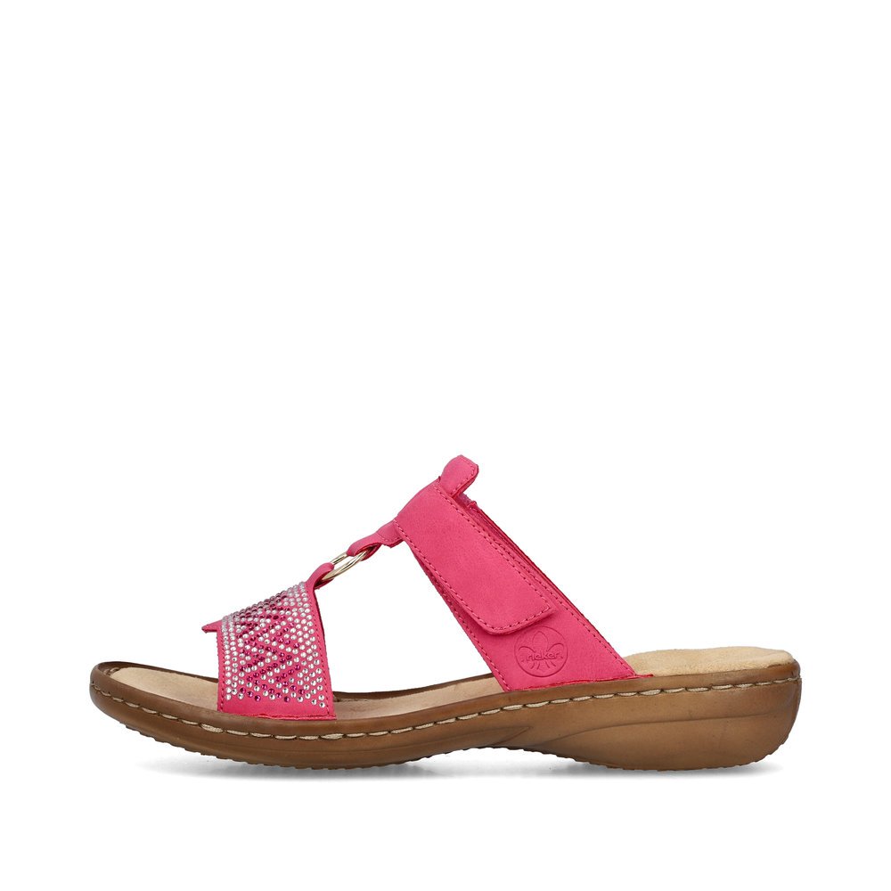 Pink Rieker women´s mules 60898-31 with a hook and loop fastener. Outside of the shoe.