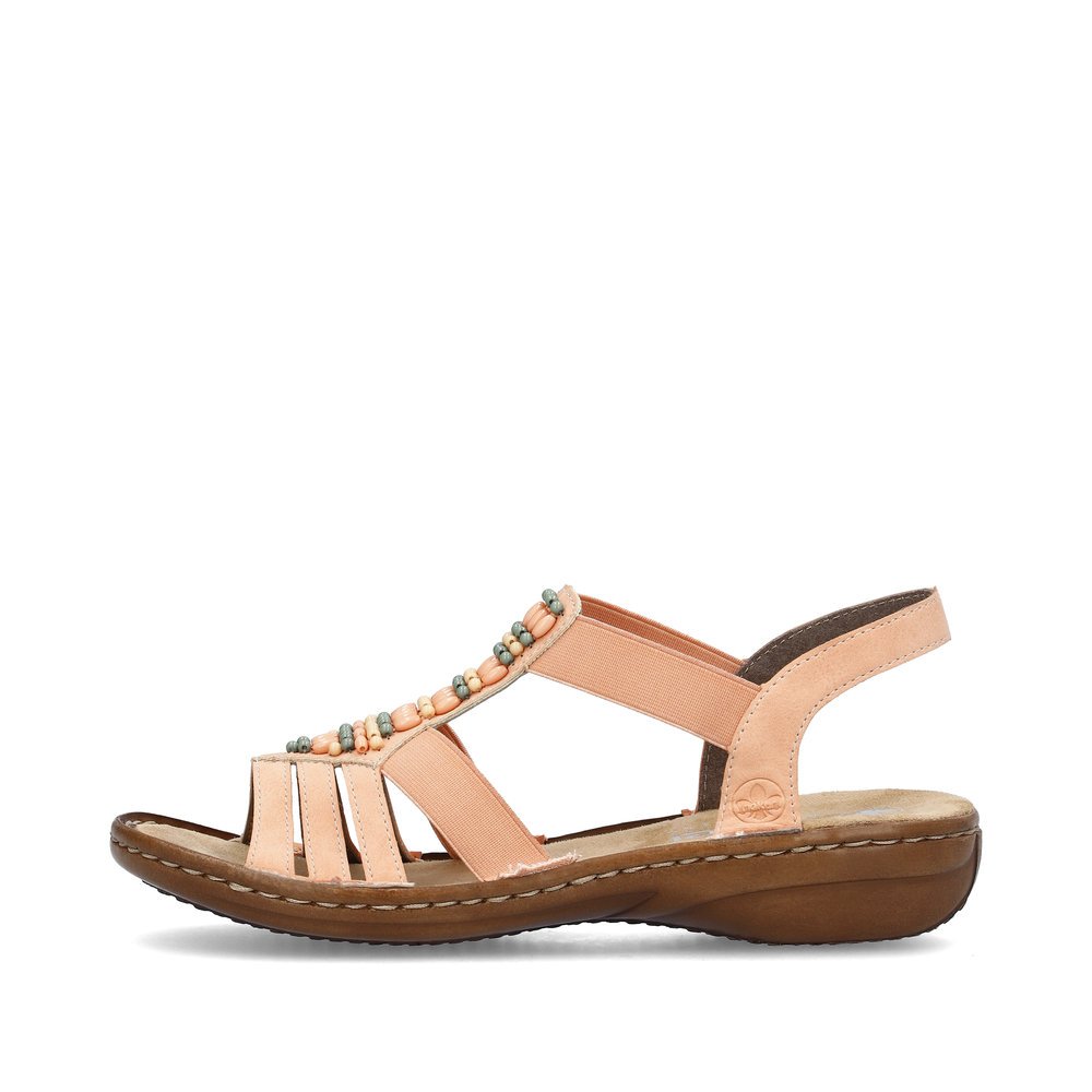 Peach Rieker women´s strap sandals 60851-38 with an elastic insert. Outside of the shoe.