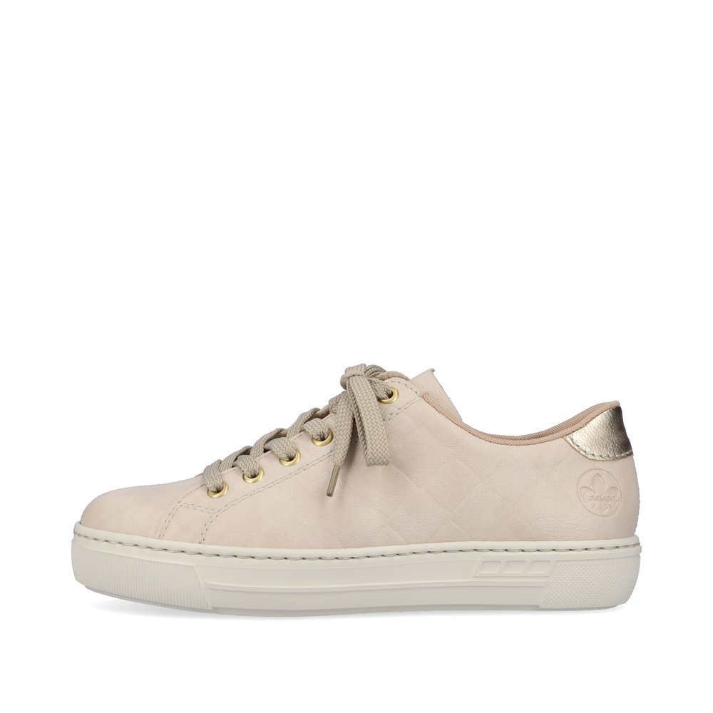 Light beige Rieker women´s low-top sneakers L9800-80 with lacing. Outside of the shoe.