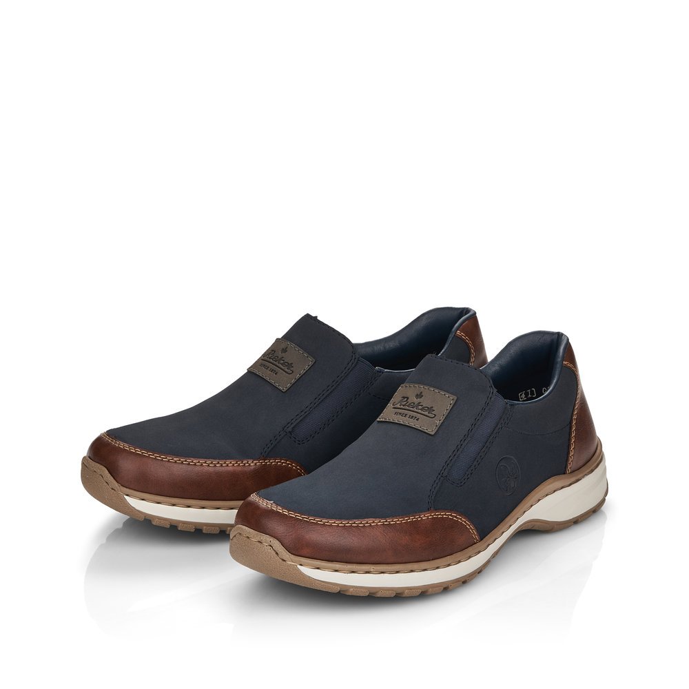 Blue Rieker men´s slippers 03354-14 with an elastic insert as well as extra width H. Shoes laterally.